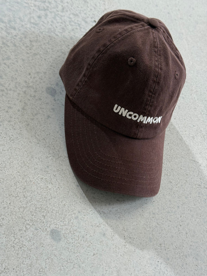 Uncommon Cap