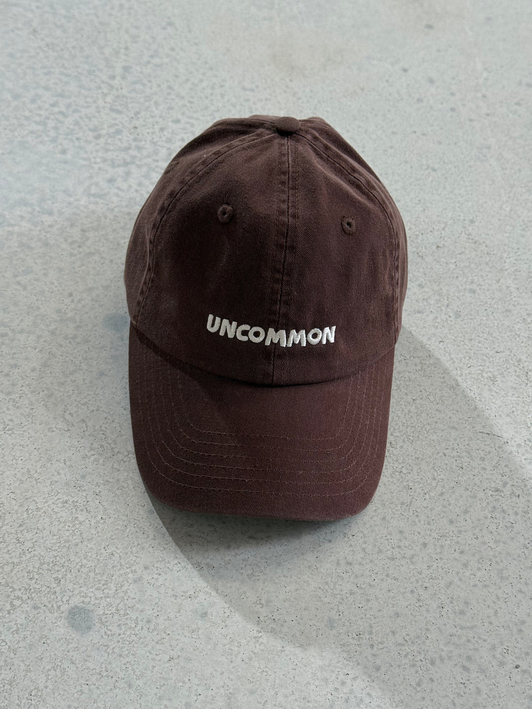Uncommon Cap