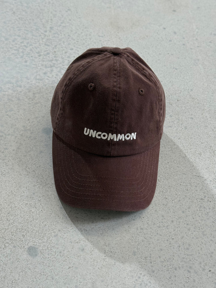 Uncommon Cap